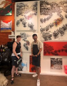 Jodi with an artist in Bangkok, Thailand