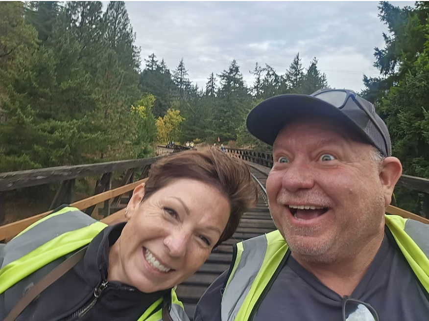 Jodi at Wandering Company and her husband on the Hood River Rail bike